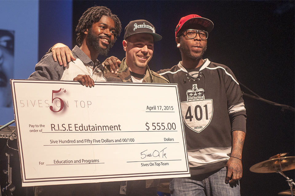 R.I.S.E. Founding Director, Randell Adjei (left) with members of Fives On Top clothing line.