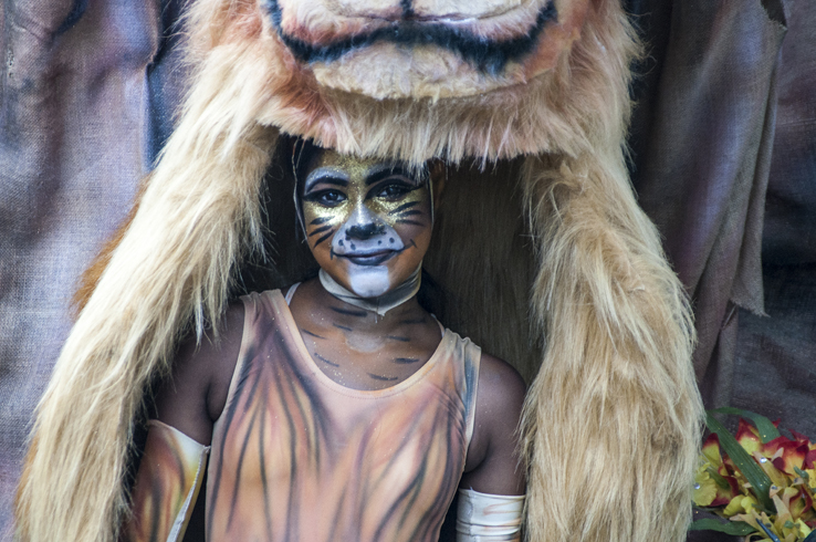 Apart of the Carnival Nationz’s On Broadway theme, Reeyana Singh took on the mighty role of sporting a colossal float that showcased the different characters of Disney’s “The Lion King”. Walking past it and not stopping to stare or snap a few shots is simply out of the question – it is a sight to be seen. Masquerading as Simba’s boo, Nala, Singh is quite literally marching with her pride on her back, and she does so with a smile. 