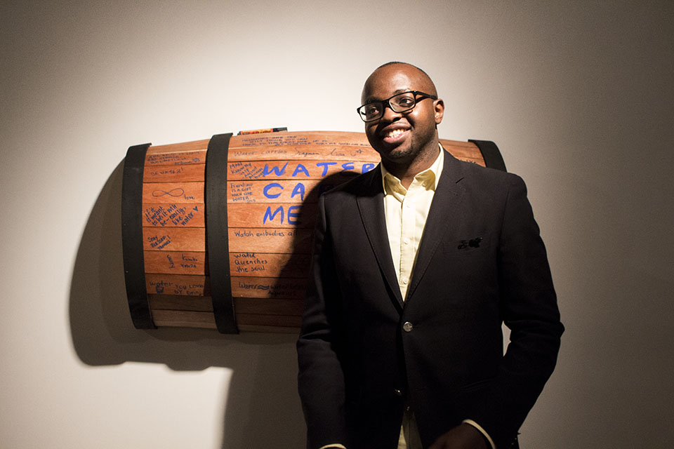 Curator Chinedu Ukabam at his fashion exhibit, “Water Carry Me Go” // Photo © Angelyn Francis & Urbanology Magazine
