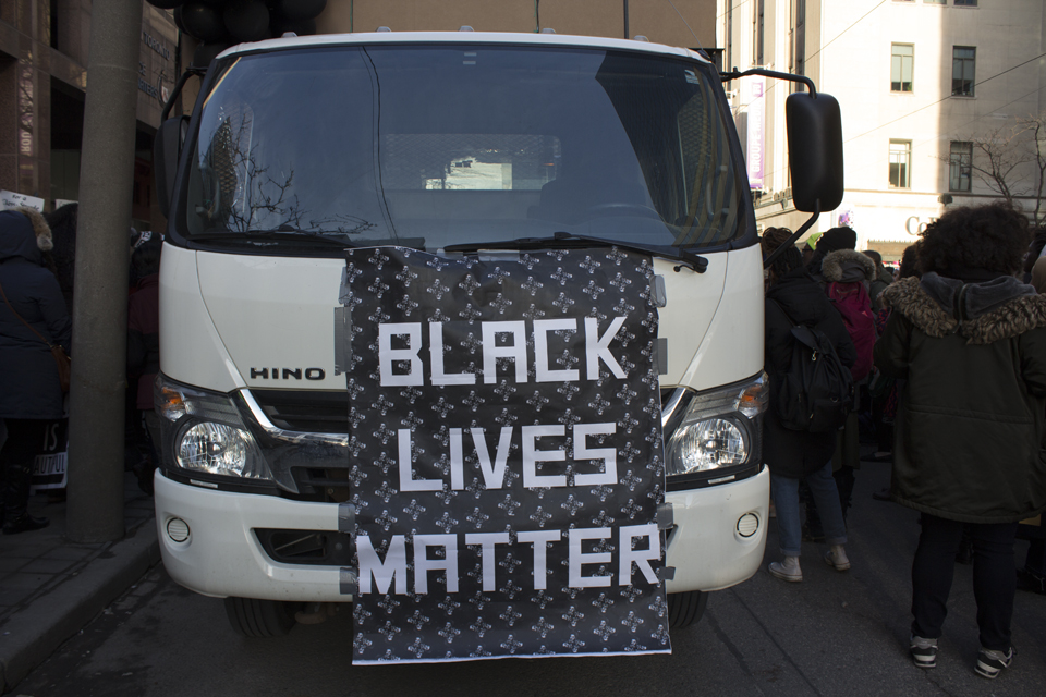 A rally organized by Black Lives Matter TO was held in front of the Toronto Police Service headquarters (40 College St.) on Saturday, March 26, 2016. // Photo © Priya Ramanujam & Urbanology Magazine 