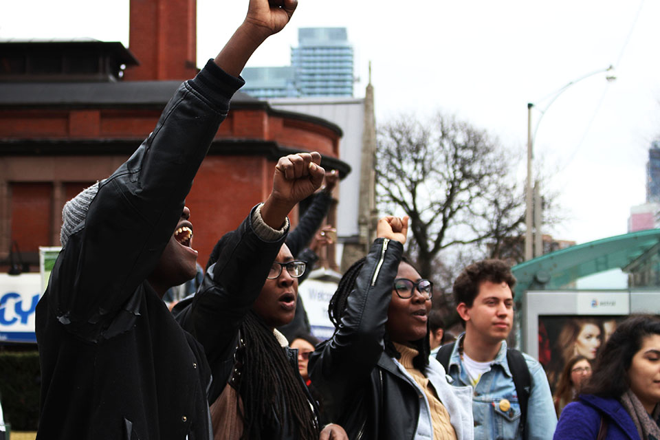 A group of University of Toronto students chant at an action led by the Black Liberation Collective. // Photo © Angelyn Francis 